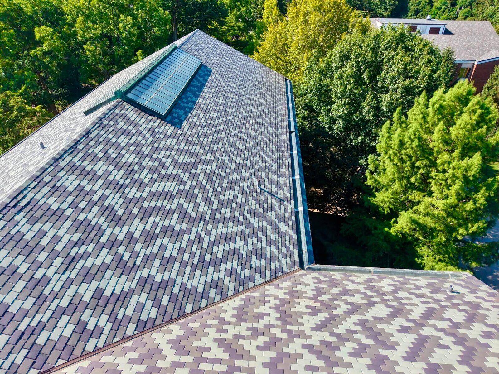 Close aerial detail of new architectural shingle roofing.